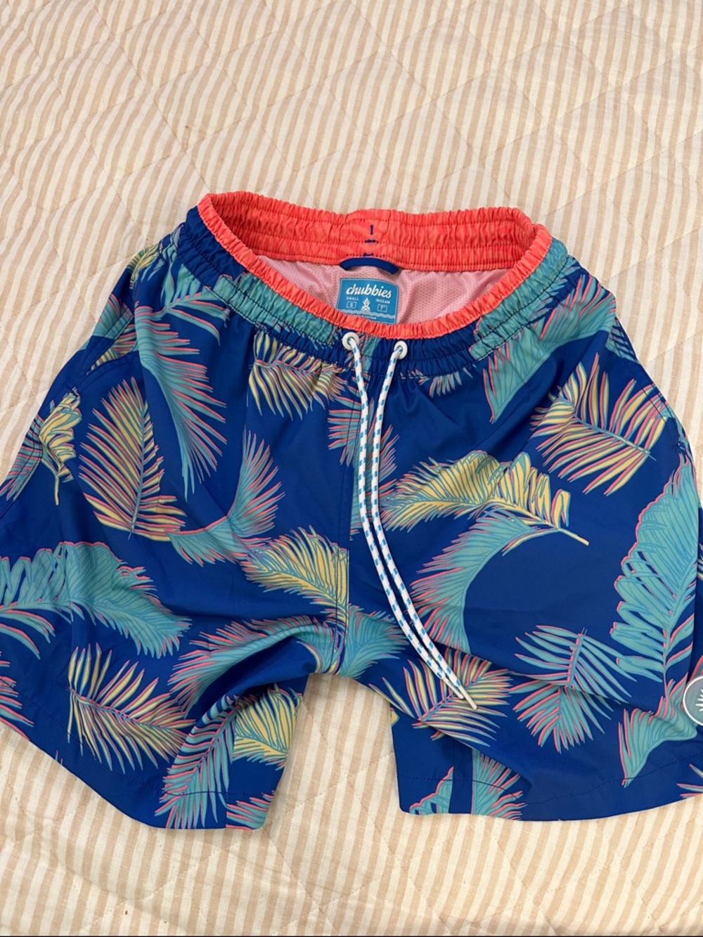 chubbies Navy Swim Shorts with Coral Waistband and Tropical Palm Print